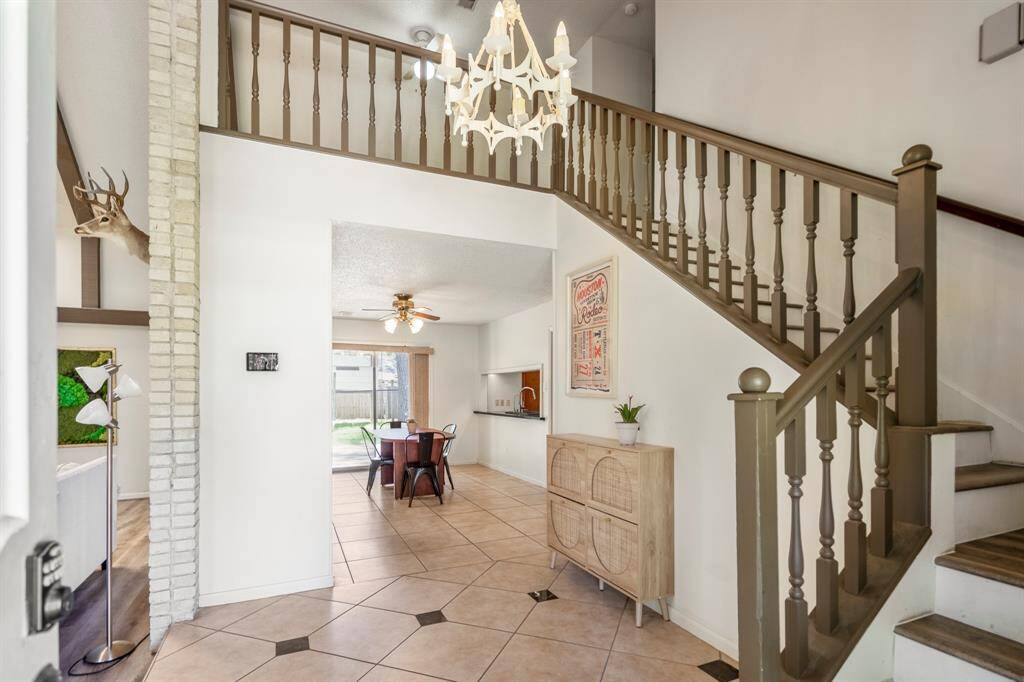 Another look at the entry. The living room is to your left. Straight ahead is your dining space and kitchen.