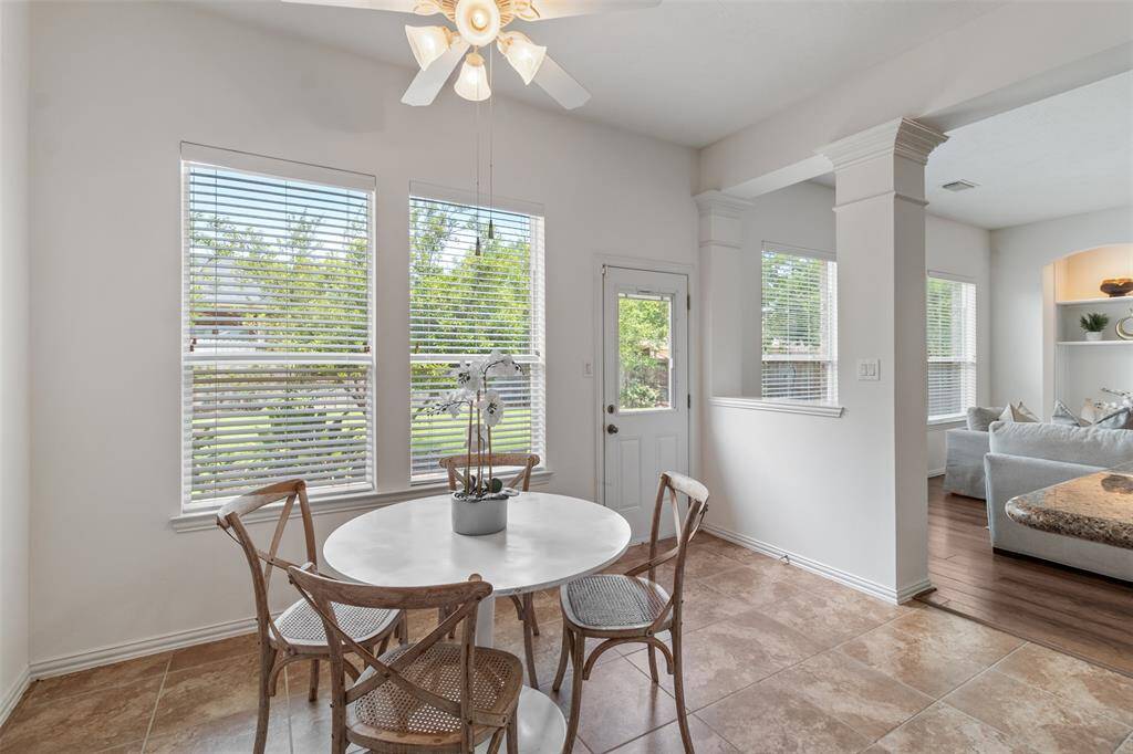 The breakfast room looks out into the well manicured backyard and is big enough for rectangular table if you need one.