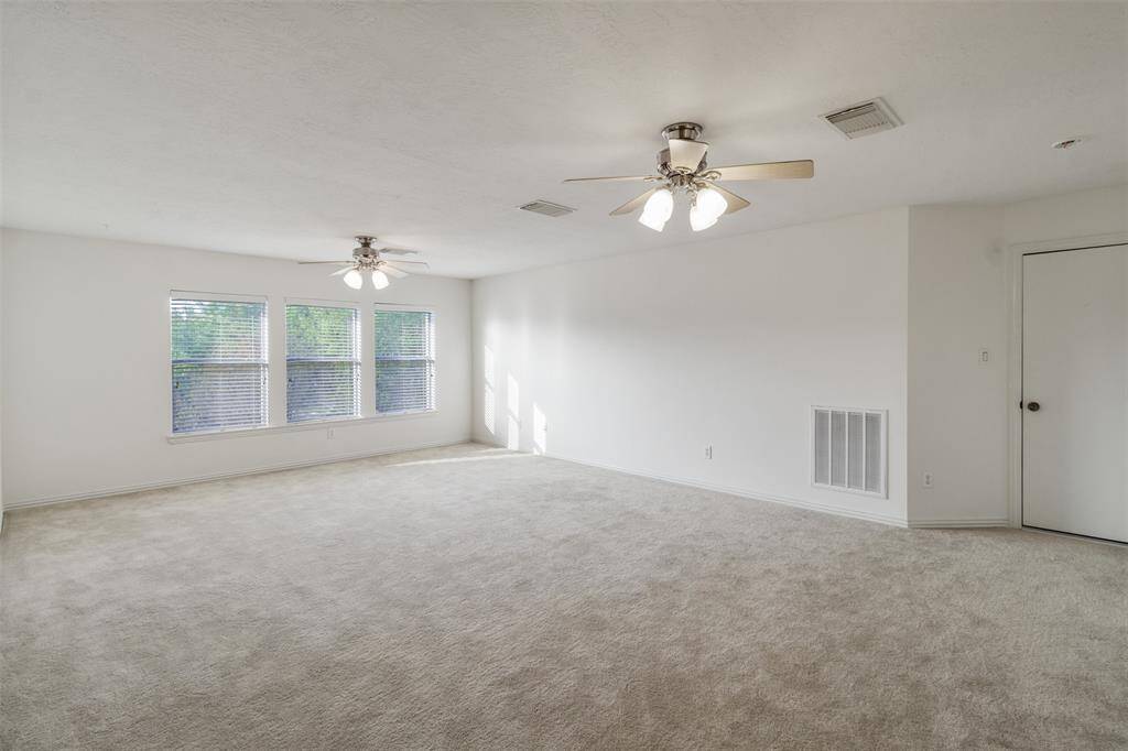 Upstairs is a massive gameroom or could become a 4th bedroom.