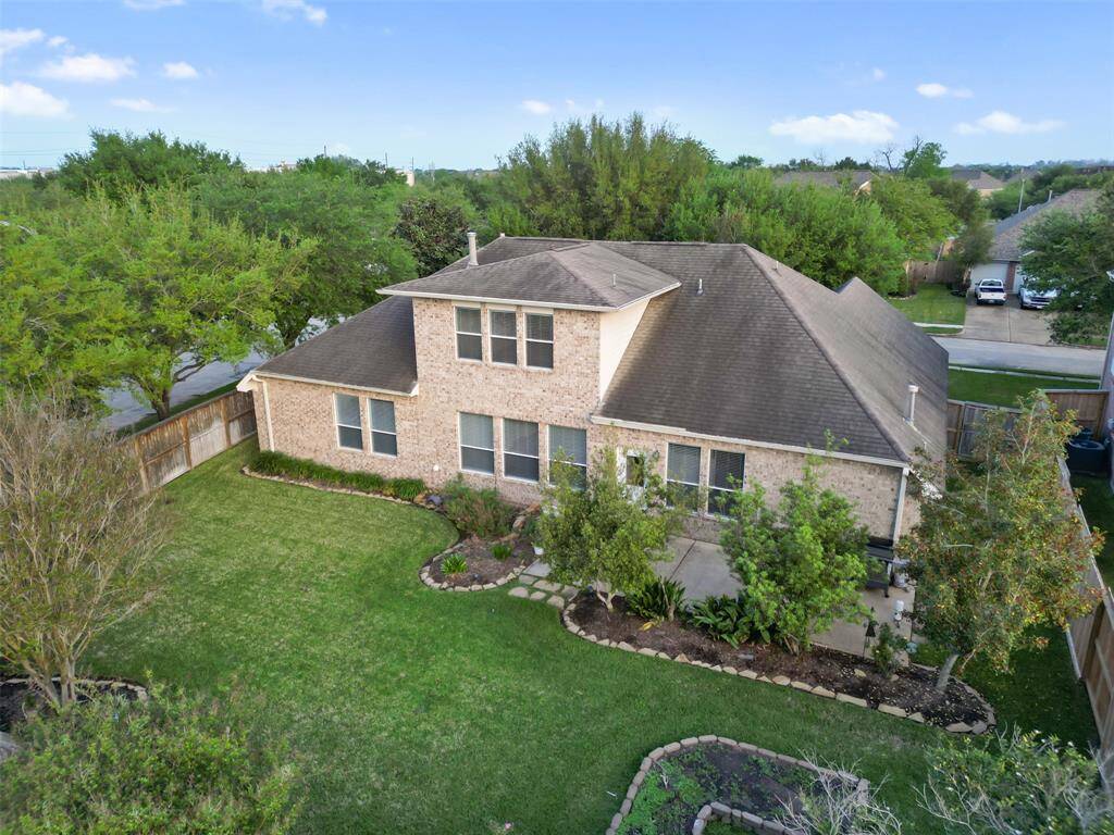 This backyard has been well- maintained and a new fence surrounds the property.