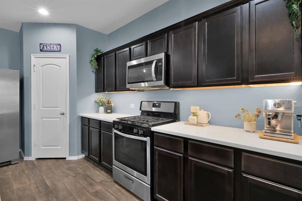 Stainless steel appliances and under cabinet lightning make for a winning combination!