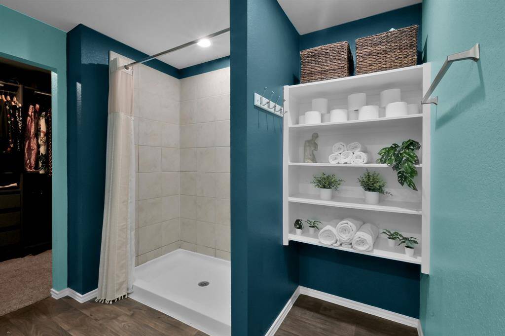 The additional storage to the right of the shower gives you plenty of storage space for all of your favorite things!