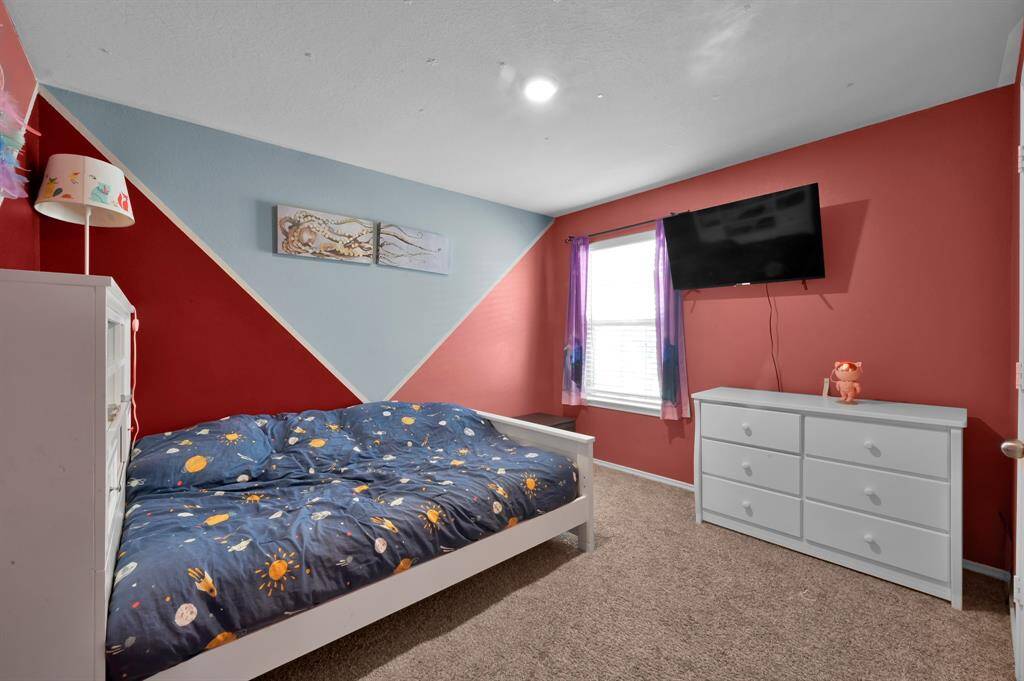 Secondary bedroom on the right side of the home.