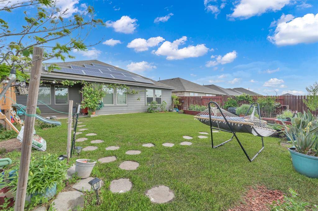 Notice the solar panels? They'll be PAID OFF at closing so this home will save you money and give you peace of mind for affordability!