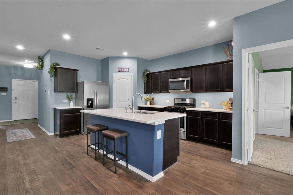 The kitchen is a great size with ample cabinetry for storage.