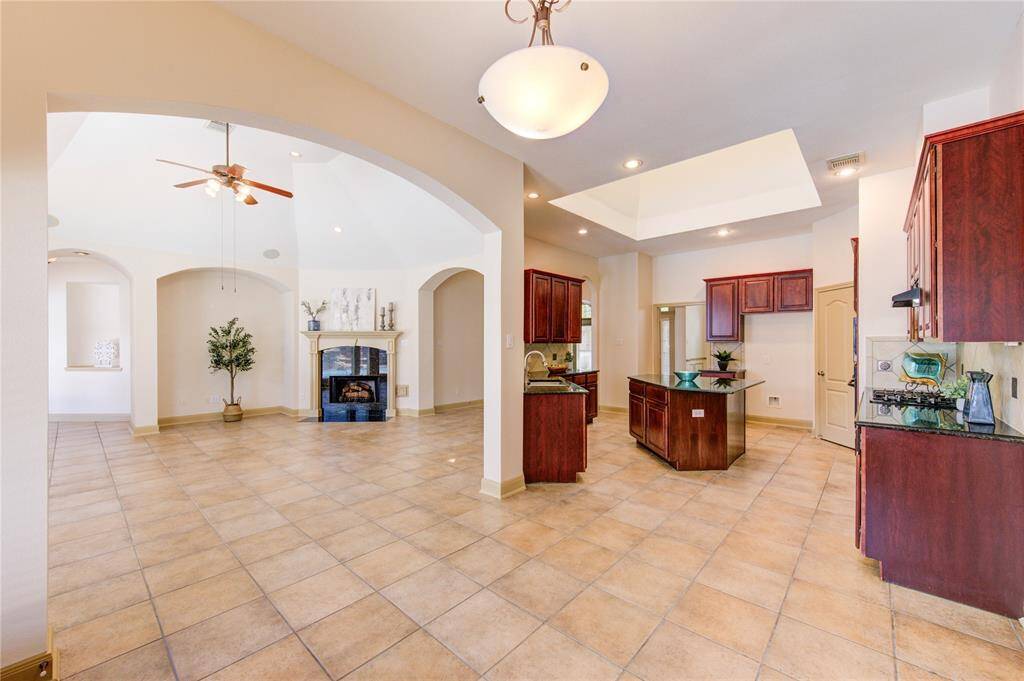 Beautiful kitchen that flows seamlessly into the living room, creating a perfect space for cooking, entertaining, and everyday living.