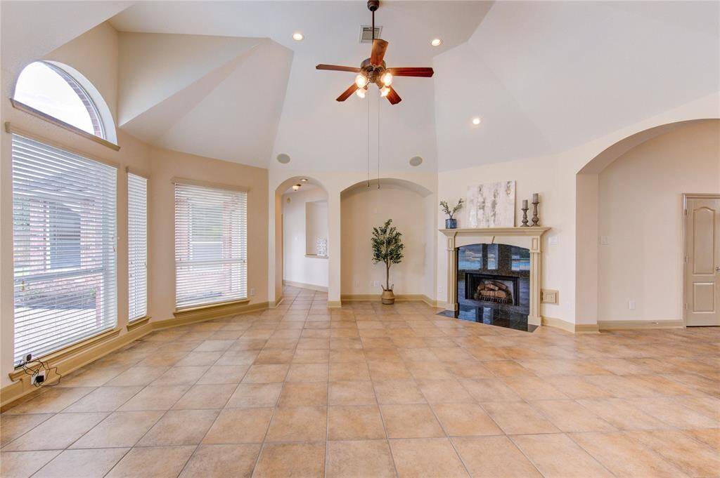 Cozy living room featuring a gas log fireplace, adding warmth and charm to the space.