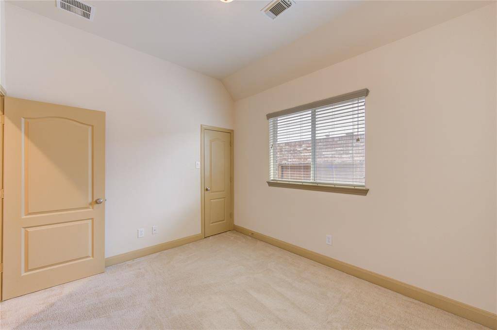 Retire to this charming bedroom and enjoy a quiet, delightful space all your own.