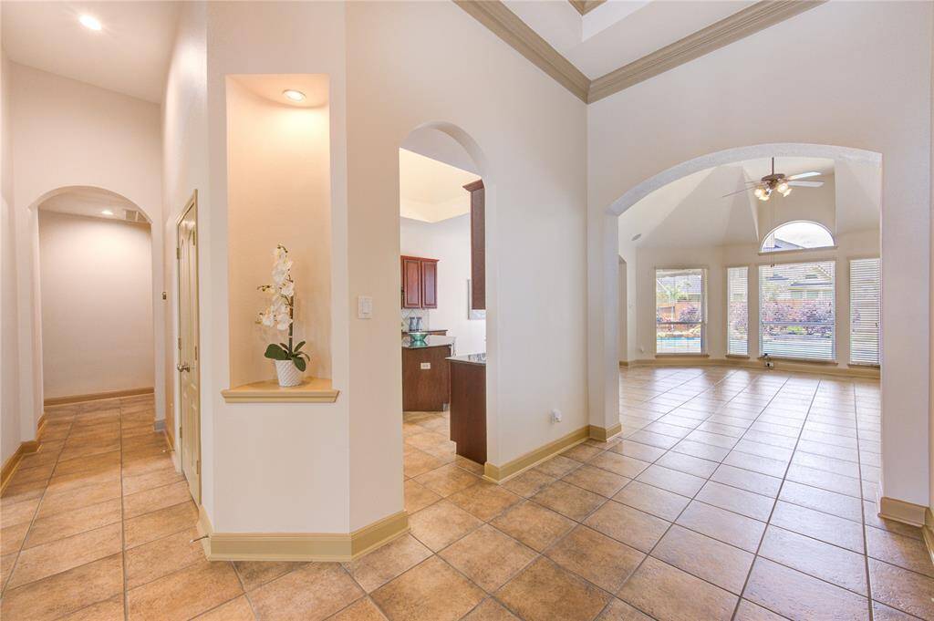 Open floor plan seamlessly connects the kitchen, dining, and living areas—perfect for modern living and entertaining.
