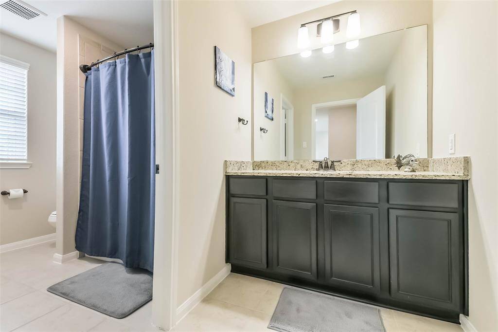 Full bathroom upstairs with tub/shower combo