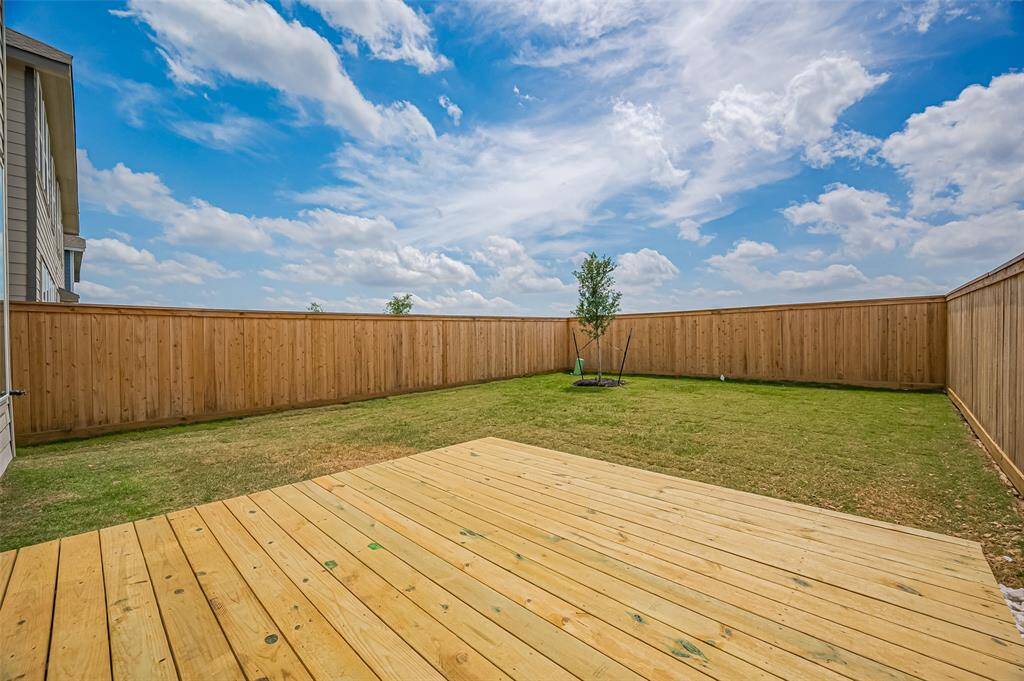 Enjoy a convenient patio deck, perfect for your favorite backyard activities.