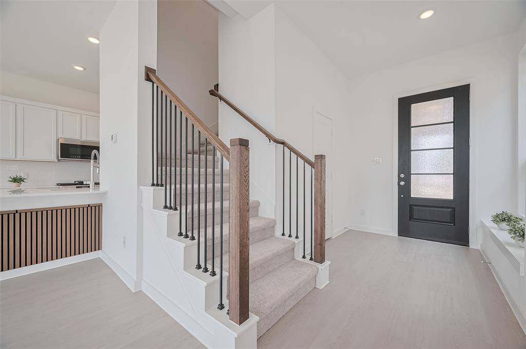 Beautiful entry with a convenient powder room.