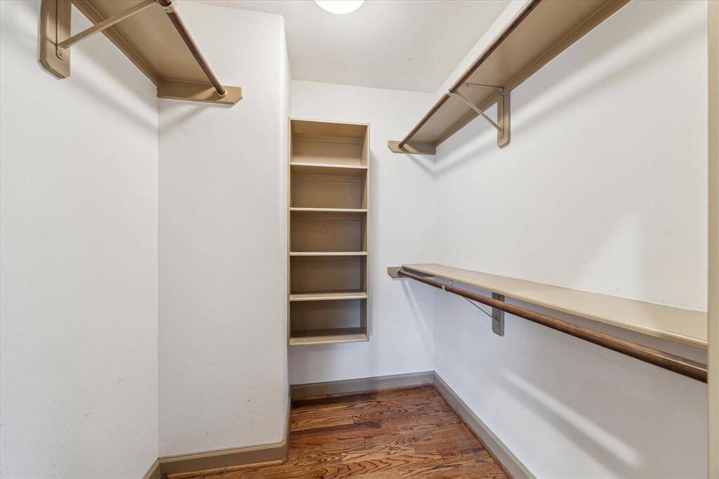 Secondary primary suite closet. An ideal his-and-hers.