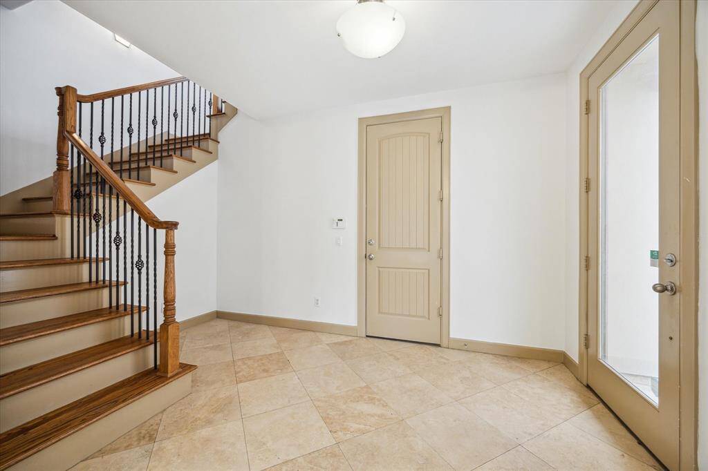 A welcoming large entry - With plenty of room to create office nook to utilize three bedrooms.