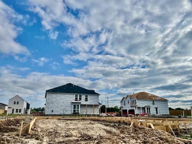 Three-story home with 4 bedrooms, 3.5 baths and 2 car garage.