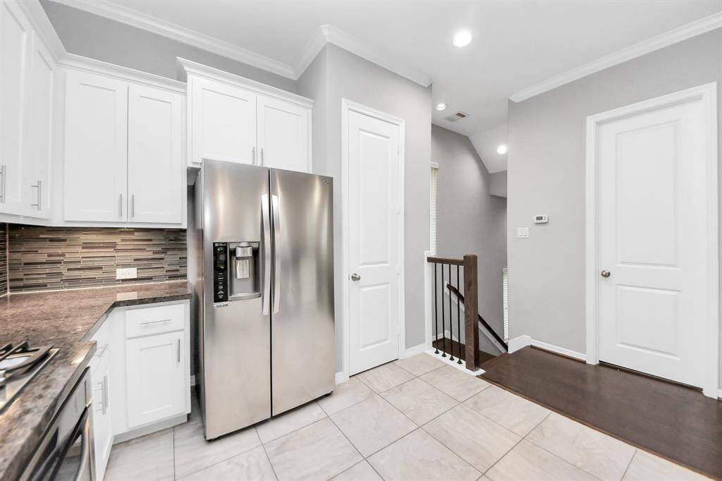 Fridge stays with the property