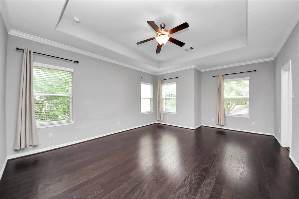 This primary bedroom has no shortage of space!