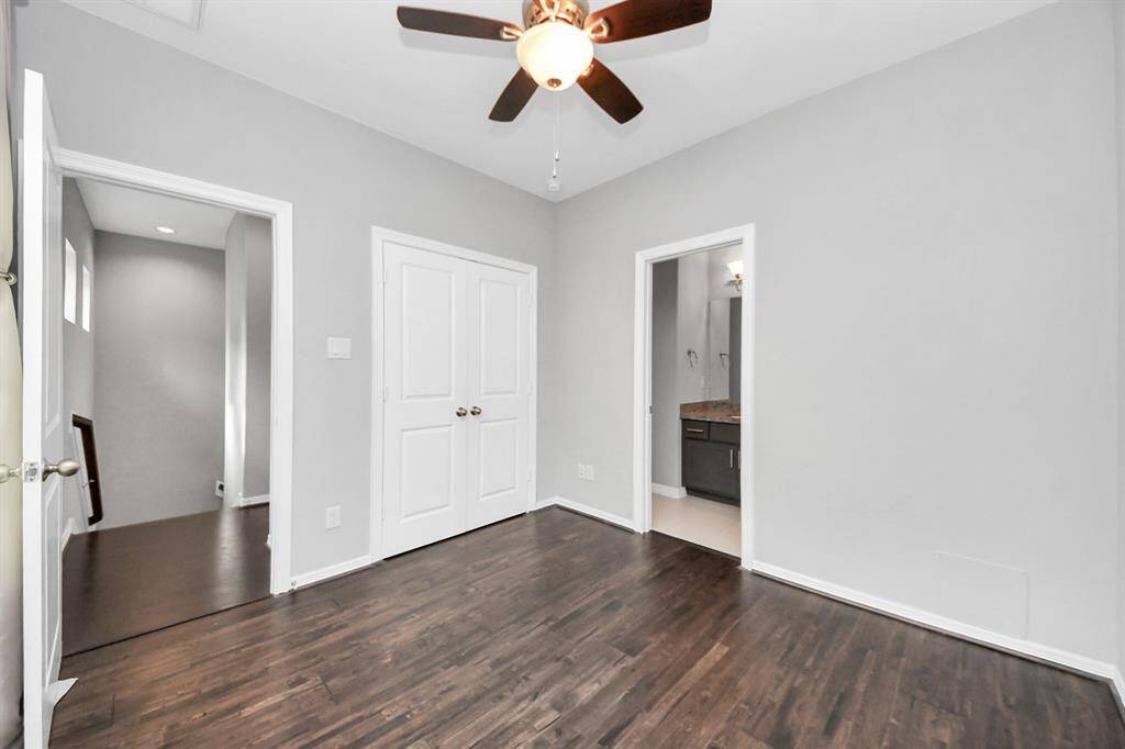 Third floor bedroom features its own clsoet and full bathroom.
