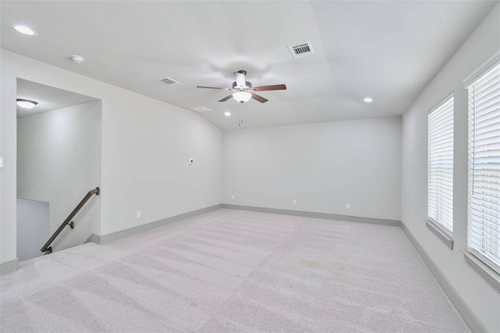 Is this your game room, guest suite, or man cave?  Enjoy this huge space with full bath.