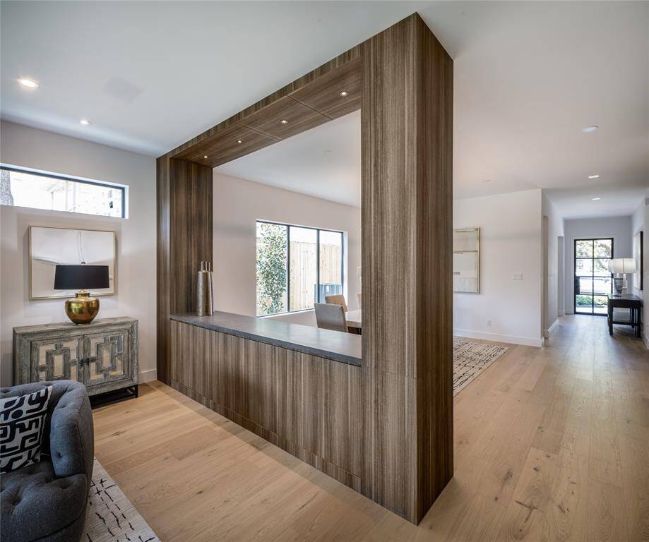 custom-built buffet style with recess lights built-in cabinetry maximizing the storage space