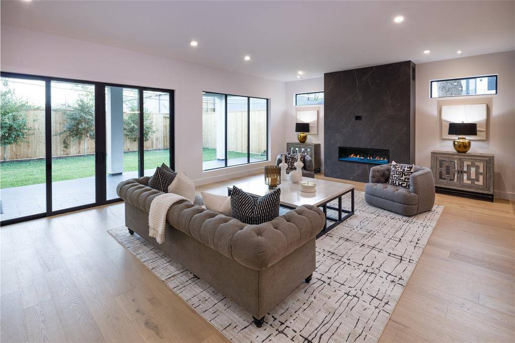 A beautiful living room is the heart of every home. Features a sliding glass door opens to a large back yard with room for a pool.