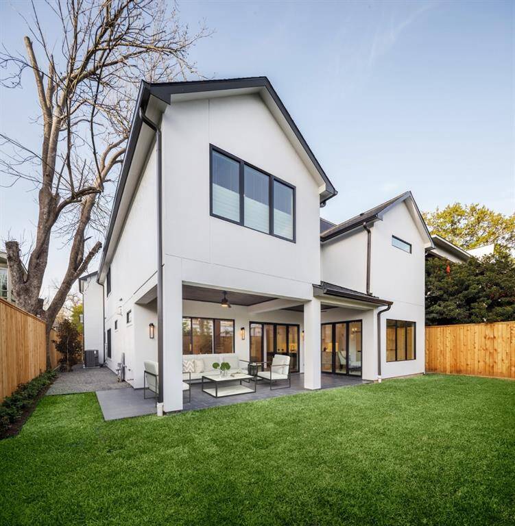 Exterior view of the house. Fully fenced huge back yard with plenty of room for a Pool.  Photo is virtually staged