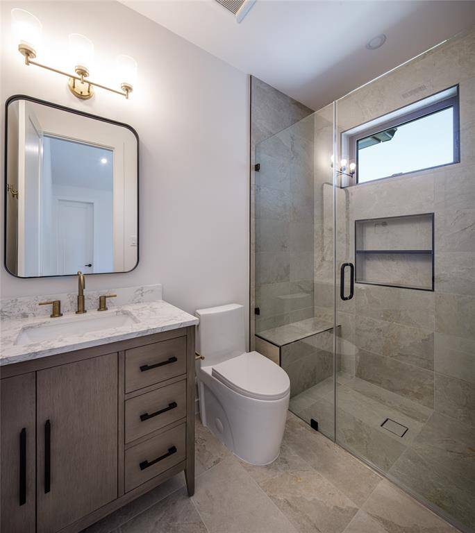 A second En-suite bathroom with walk-in shower