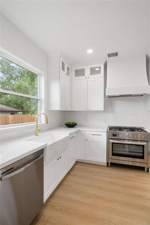 Light filled veiw if  the kitchen sink and the window overlooking hte back yard.