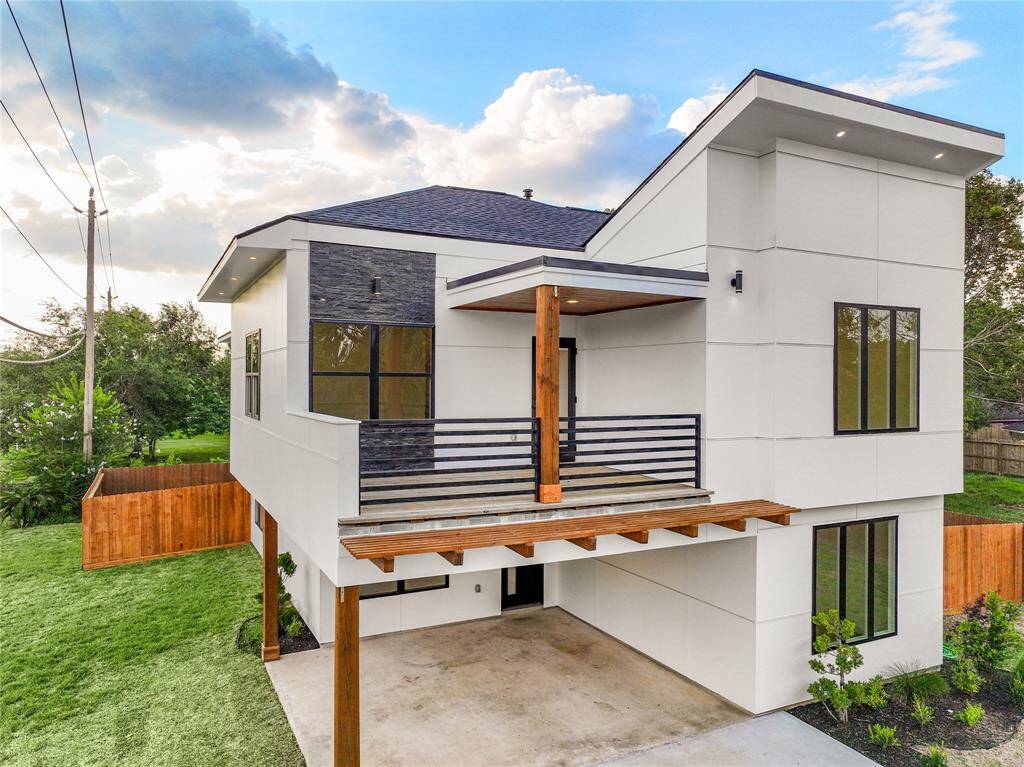Home is located on the corner of Garfield and Bayshore Drive . Please note the luxurious Port-o-Cochere which leads to leads to extended oversized driveway