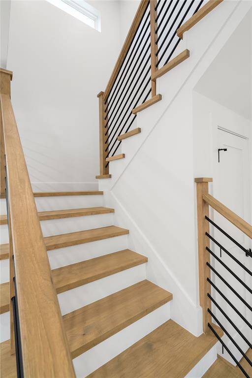 Elegant staircase bring us to the spacious Game Room