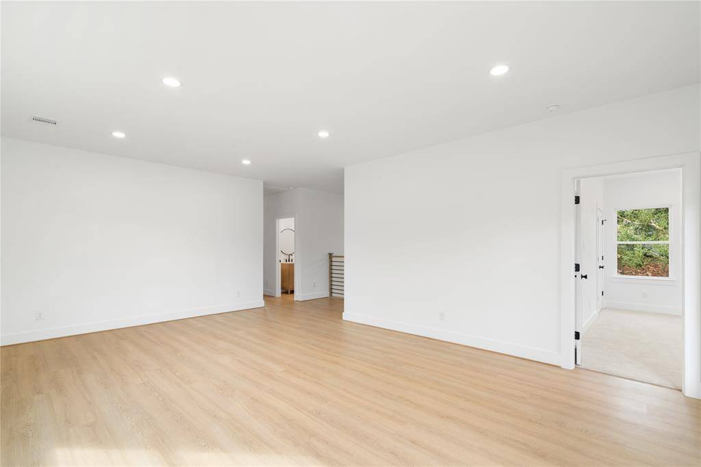 Primary bedroom is located upstairs - view from the Game room into the Primary Bedroom