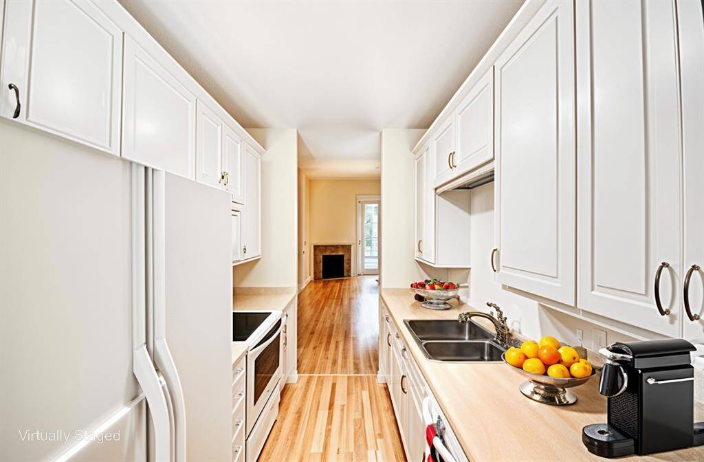 The master bedroom boasts a charming window nook, ideal for reading or relaxing, along with a spacious walk-in closet and a private en-suite bathroom for ultimate comfort and convenience. It easily accommodates a king-size bed, side tables, and a chest, providing both style and functionality.