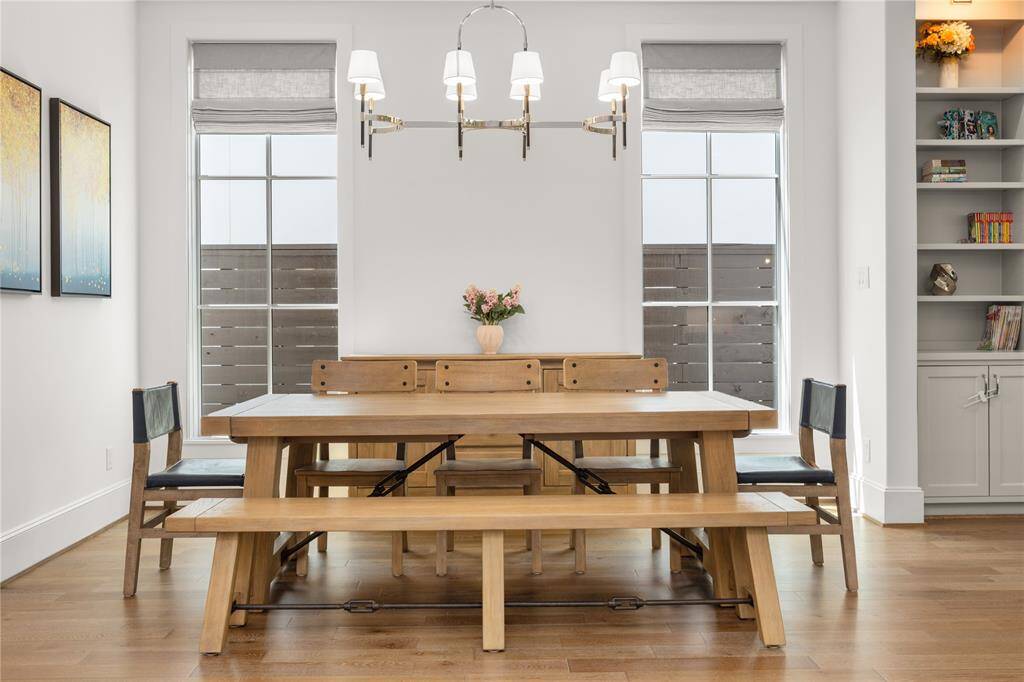 Formal dining w/ natural light and open to the living room & ktichen area