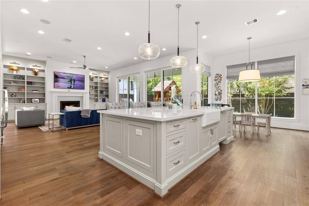 Huge island w/ paneled sides & storage in front & back, soft close.