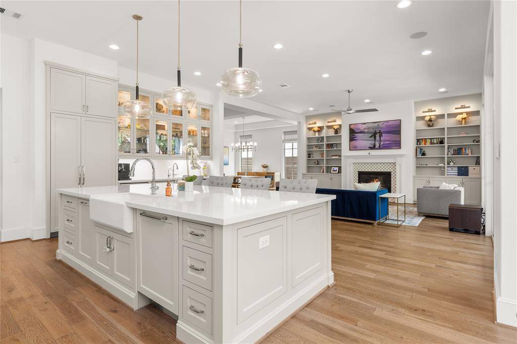 Built in Thermador dishwasher w/ wood panel front, Soft close Thermador fridge & freezer w/ wood cabinet front, built in garbage.