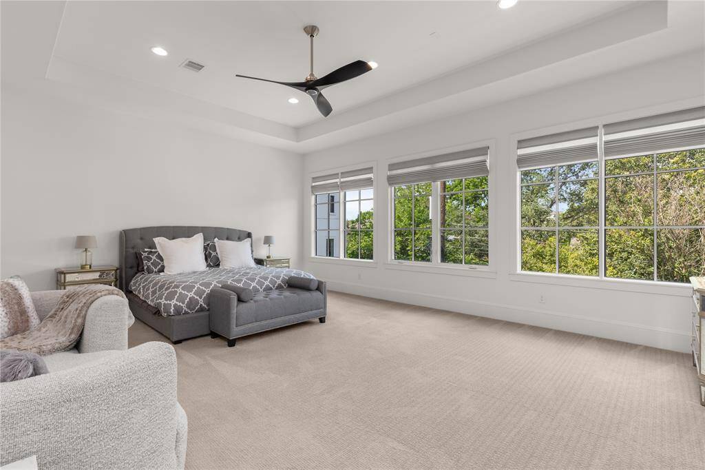 Massive primary retreat w/ plenty of space for a seating area.