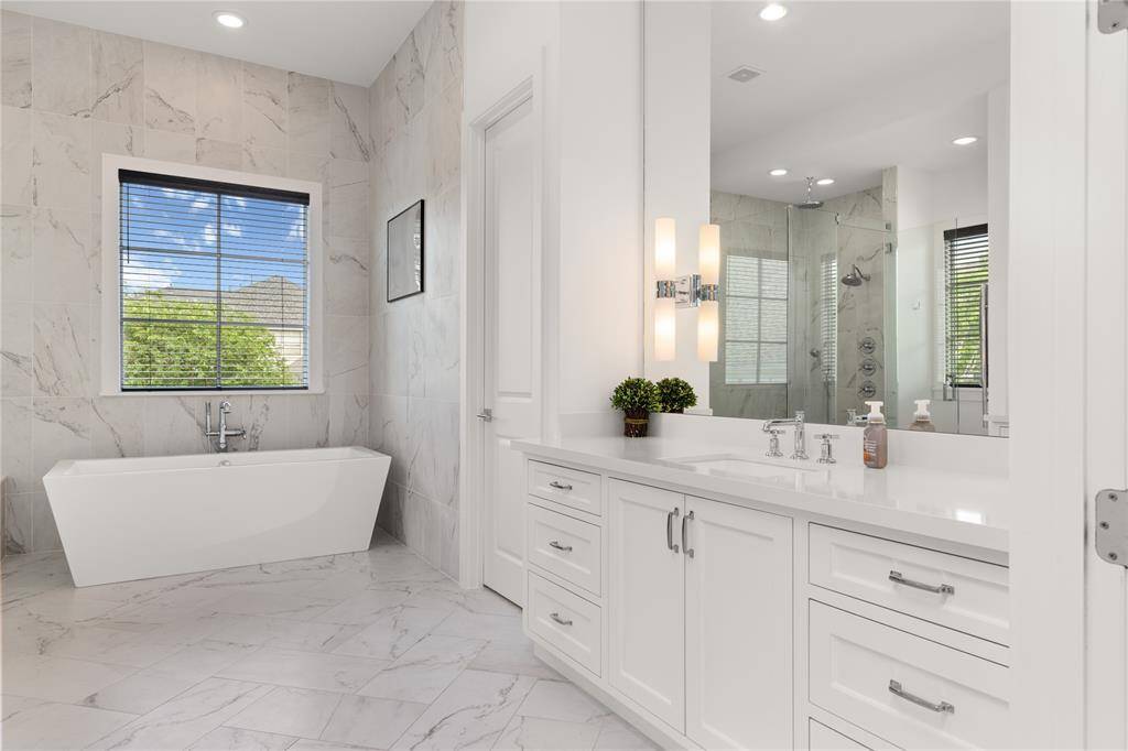 One of Two Vanities w/ plenty of drawers & counter space