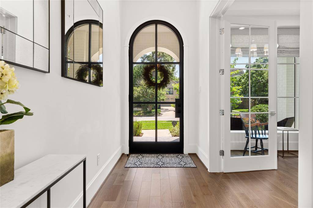 Arched glass & iron front door