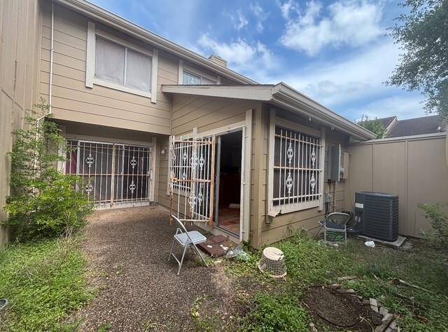 From the dining room and the kitchen/breakfast room you can access this huge patio with grassy areas.