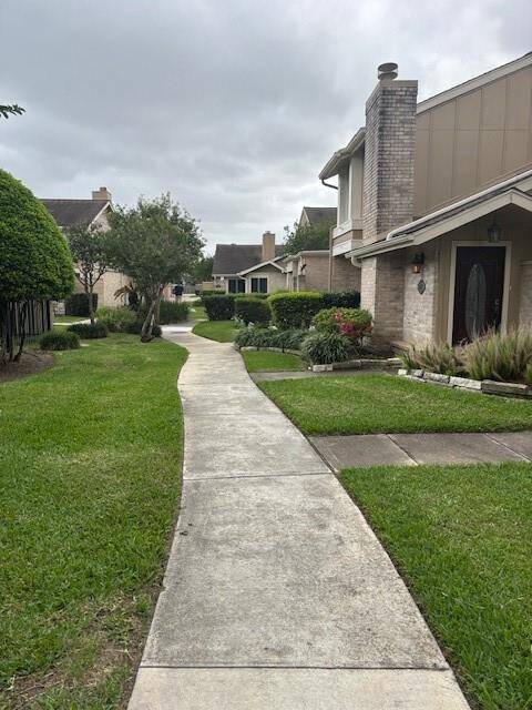 There are many sidewalks through the complex with pleasant scenery like this.