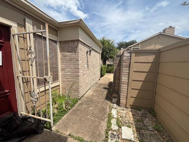 You have an recessed entry with flowerbeds to invite you in to your new townhome.