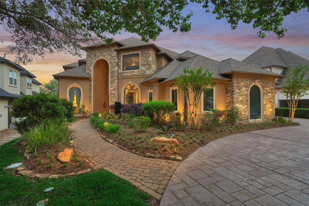 Welcome to this stately home in the prestigious country club community of Bentwater on Lake Conroe.