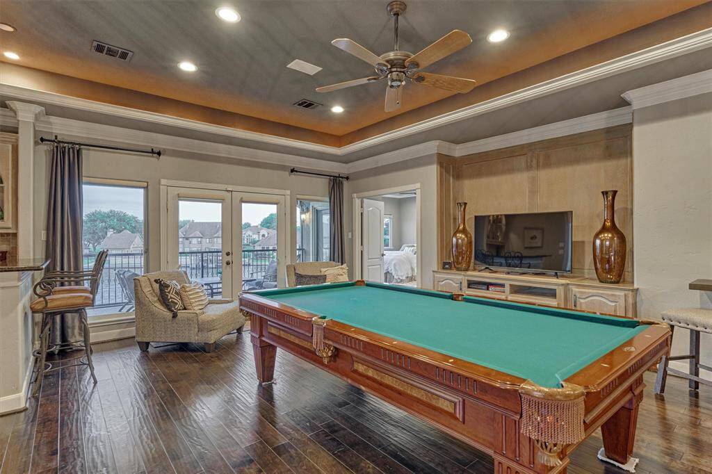 Upstairs, you'll find a spacious game room, three guest bedrooms, a media room, and an additional flex space—perfect for a 5th bedroom, gym, or hobby room. After a day on the lake, unwind upstairs with family and friends.