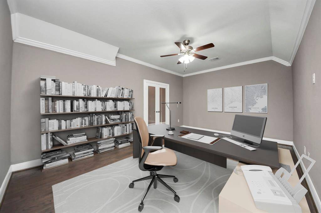 This virtually staged home office showcases glass french doors and inviting workspace designed for productivity and comfort.