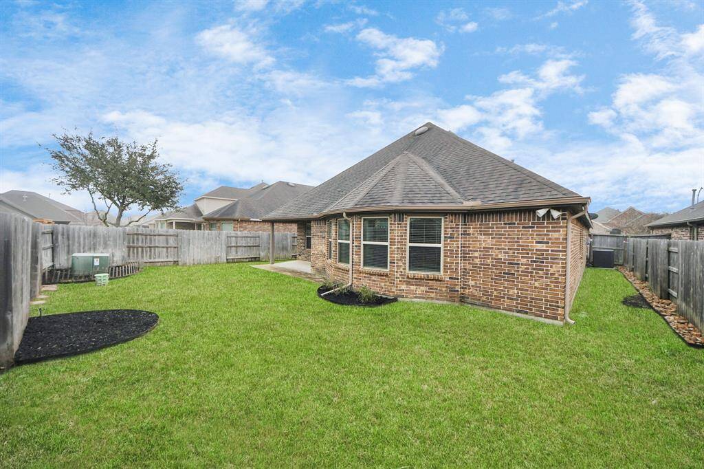 This picturesque space invites you to unwind, whether you're enjoying a morning coffee, hosting a barbecue, or simply soaking in the beauty of nature.