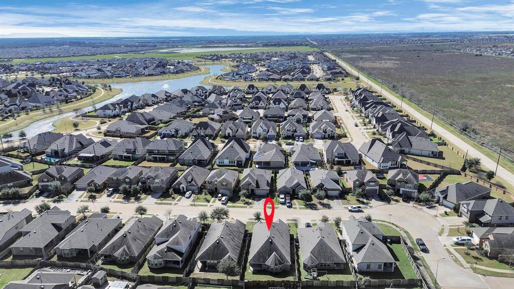 The drone view captures a stunning aerial perspective of your home nestled within the vibrant community.