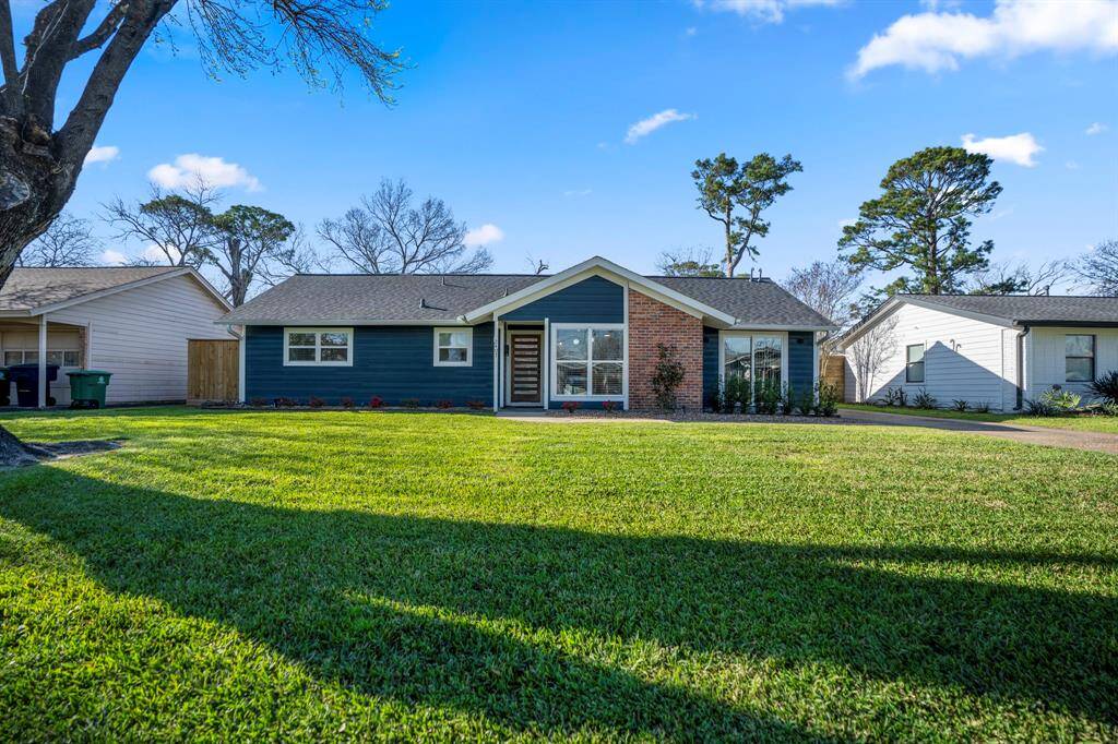 This mid-century modern has the most upscale touches throughout. Large front yard and spacious fenced-in backyard as well.