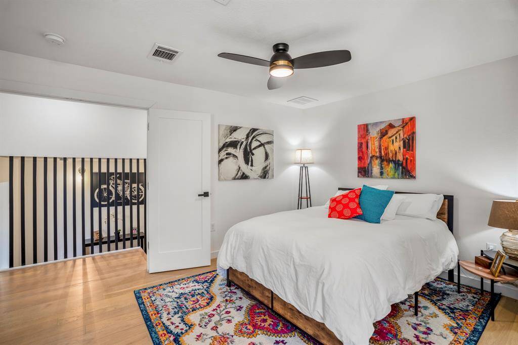 Double French doors welcome you inside your primary bedroom.