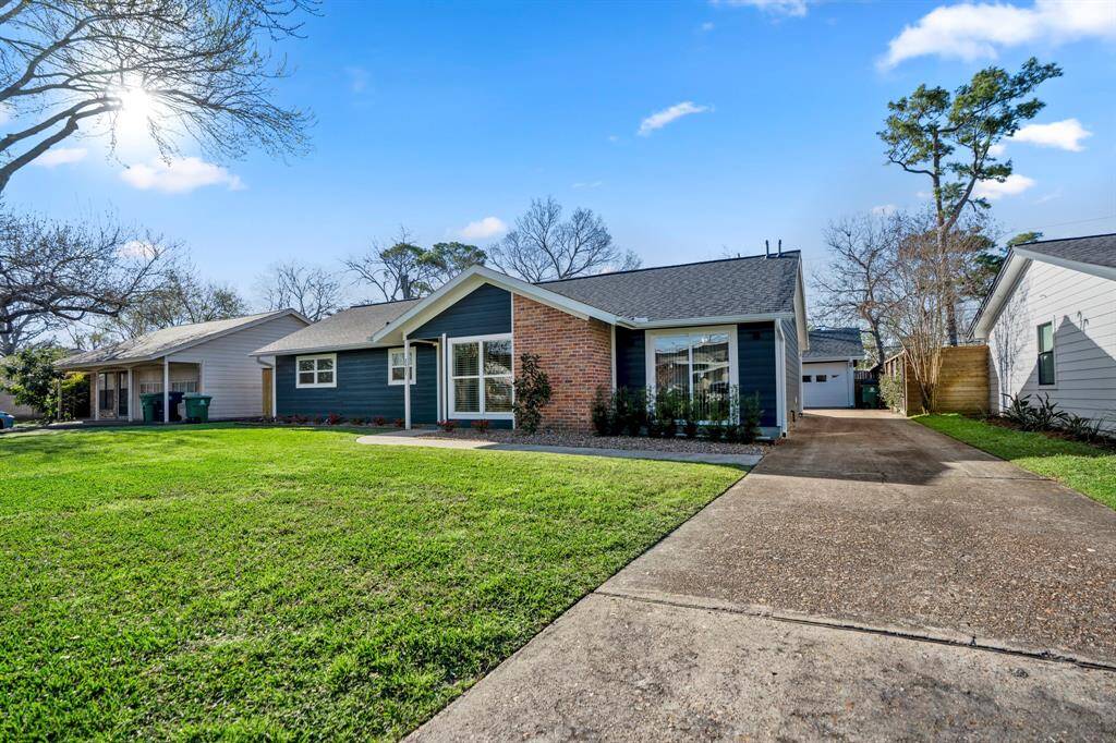 A long driveway leads to a detached two car garage. Driveway fits 10 cars easily for your friends and family.