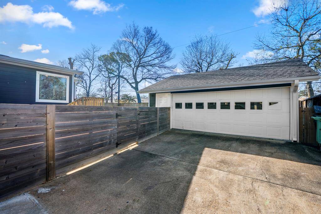 Your detached two car garage. Fence allows you to exit from the backyard.